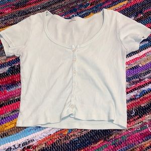 j galt button up top